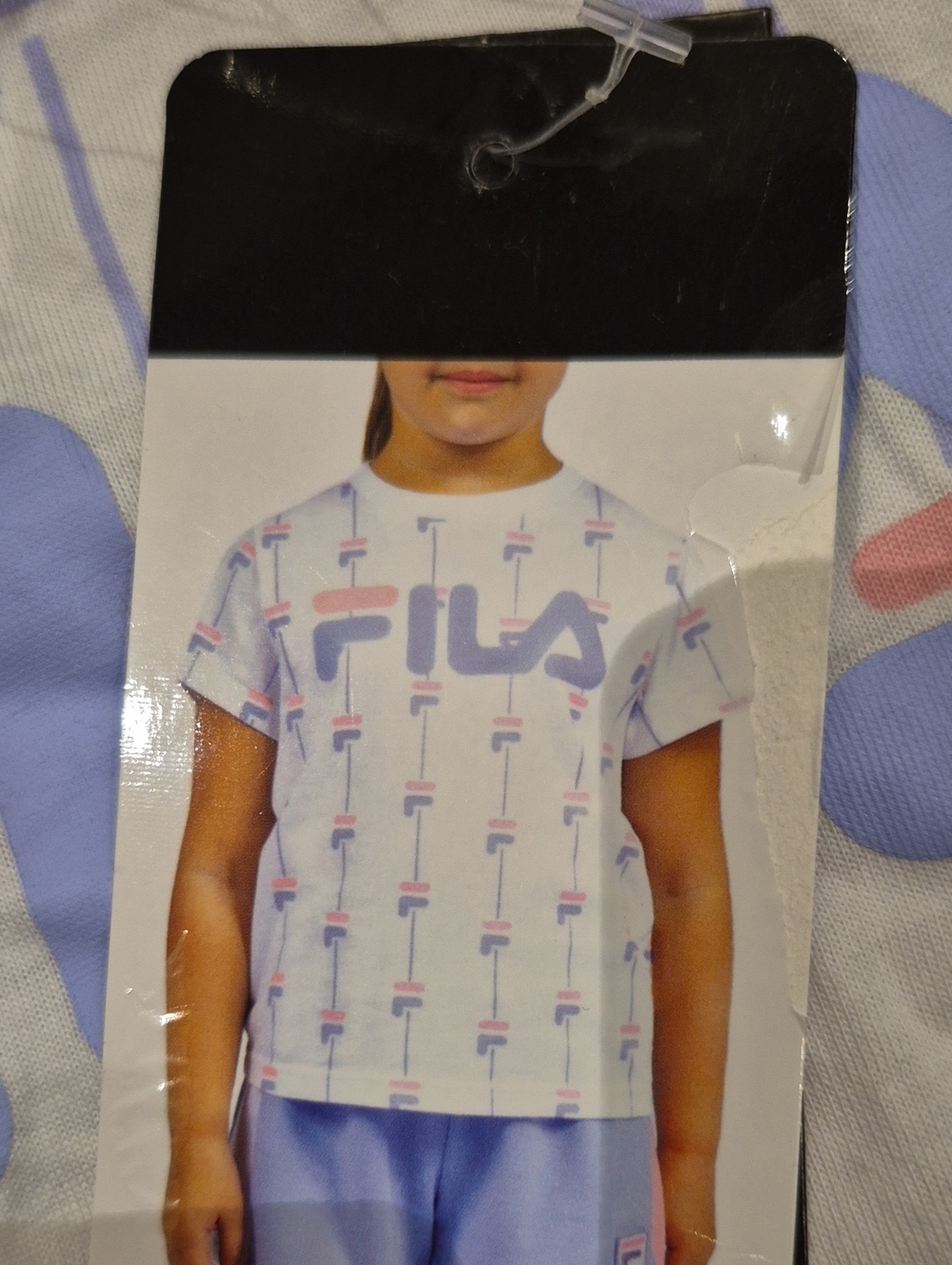 Size 7: Kids Fila White Short-Sleeve Tee with Pink & Lavender Logo Pattern